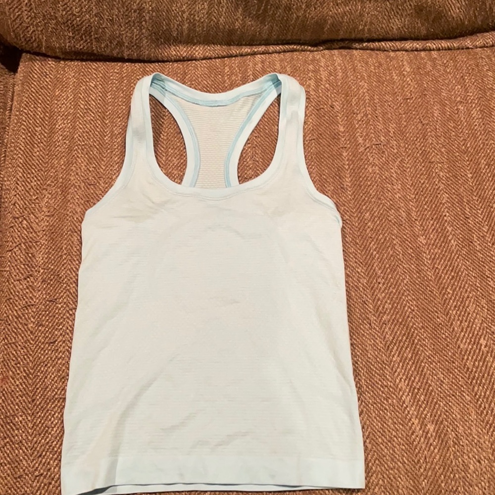 Light blue lulu lemon size 0 tank top. Swiftly Tech Racerback Tank Top 2.0